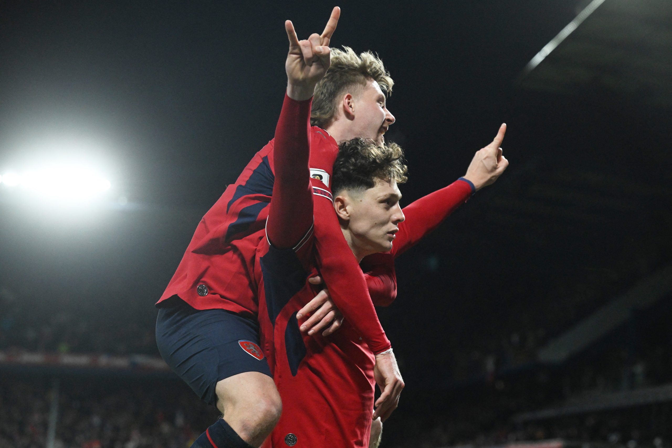 Czech Republic's defender #07 Ladislav Krejci (R) celebrates with Czech Republic's midfielder #15 Pavel Sulc after scoring the 2-1 goal during the first period of extra time during the FIFA World Cup 2026 European qualification final football match Czech Republic vs Denmark on March 31, 2026 in Prague, Czech Republic. (Photo by Michal Cizek / AFP)