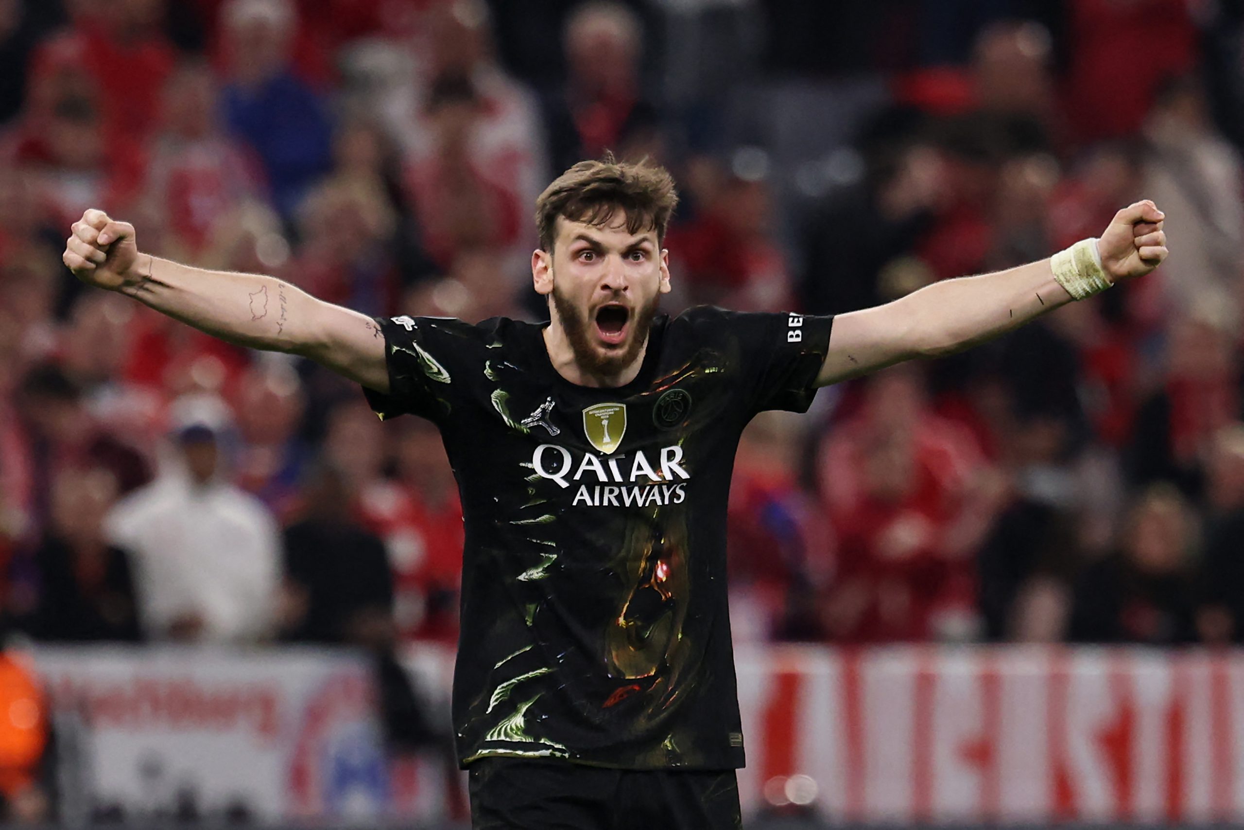 Paris Saint-Germain's Georgian forward #07 Khvicha Kvaratskhelia celebrates at the end of the UEFA Champions League second-leg, semi-final football match between FC Bayern Munich and Paris Saint-Germain (PSG) in Munich, southern Germany on May 6, 2026. (Photo by FRANCK FIFE / AFP)